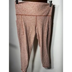 Athleta Salutation Stash Pocket Leggings Ocelot Spot Orange Women's Sz Medium